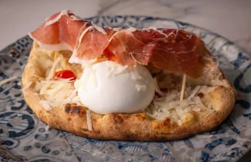 Montanarina con burrata e crudo di Parma